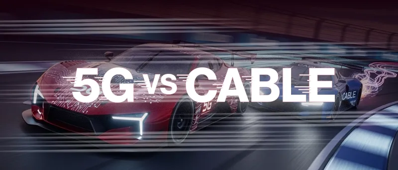Two race cars, one representing "5G" and the other "CABLE," speeding around a track with motion blur to symbolize a comparison of internet speeds.